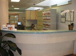 Photo of our reception desk where you will be warmly greeted!